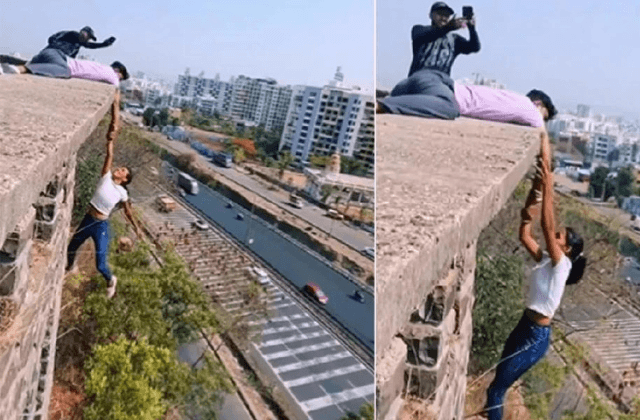 ಪಾಳುಬಿದ್ದ ಕಟ್ಟಡದ ಮೇಲಿಂದ ಸ್ನೇಹಿತನ ಕೈಹಿಡಿದು ರೀಲ್ಸ್ : ಇಬ್ಬರು ವಶಕ್ಕೆ - News Karnataka