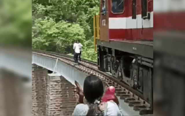 ರೈಲು ಸೇತುವೆ ಮೇಲೆ ಫೋಟೊ ಶೂಟ್ ಮಾಡ್ತಿದ್ದಾಗಲೇ ಬಂದ ರೈಲು; 90 ಅಡಿ ಆಳಕ್ಕೆ ಹಾರಿದ ಜೋಡಿ
