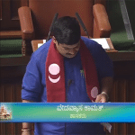 Kamath takes oath wearing tulu flag shawl