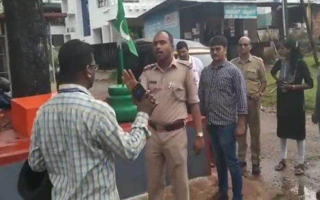 Police remove Islamic flag planted at Hindu religious shrine